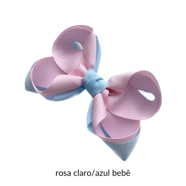 Pink and blue hair bow on a white background